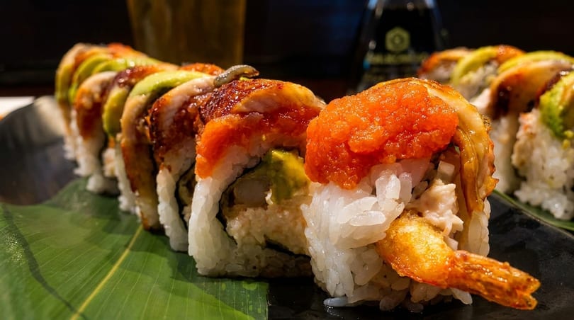 Shrimp tempura sushi roll with avocado and orange roe at Oishii Sushi Moreno Valley