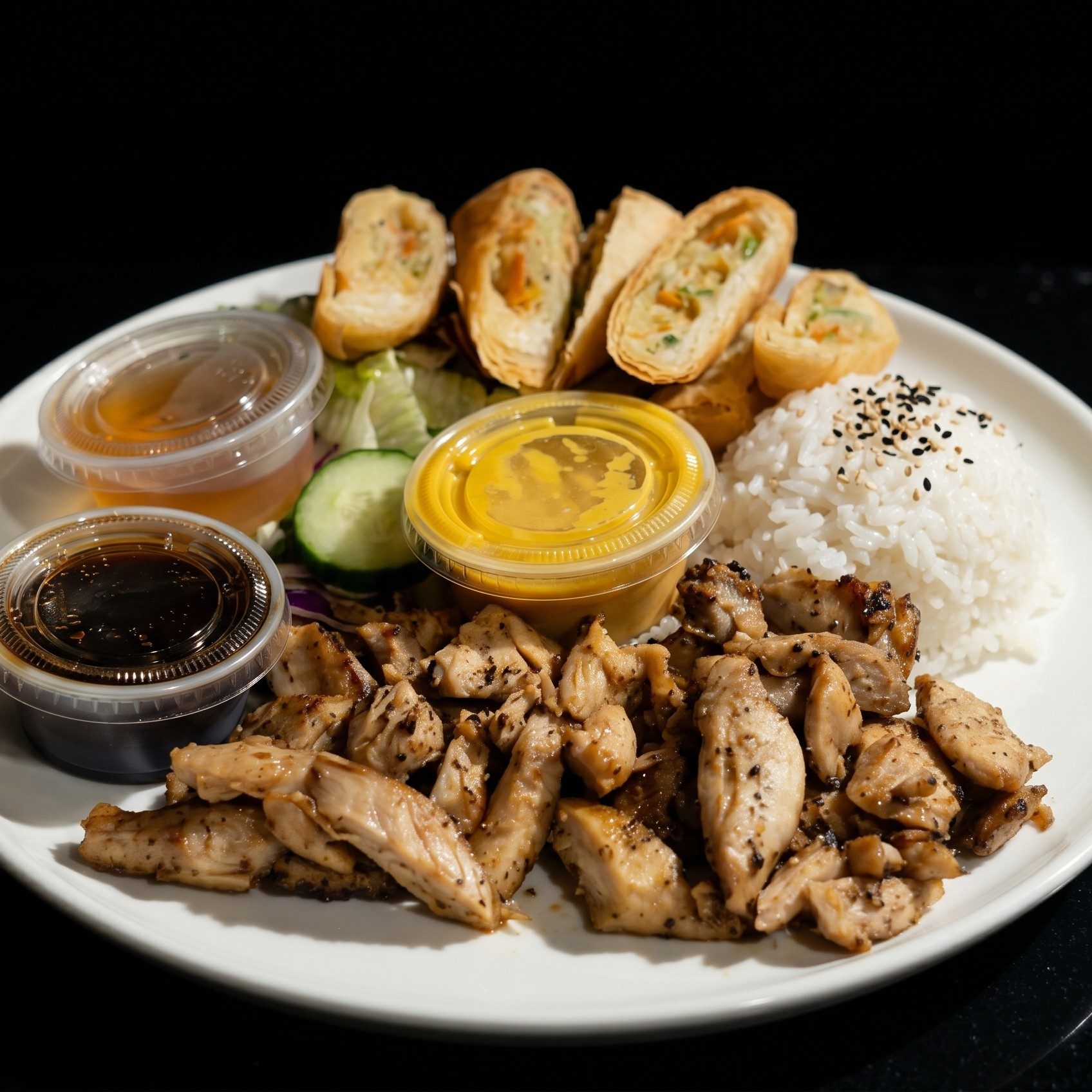 119. Chicken & Egg Roll Teriyaki Plate.